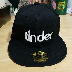 TINDER Surrender staff snap back hat.